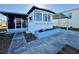 Charming single-story home featuring a cozy porch, carport, and a colorful flower box at 116 W Saint Johns Way, Apollo Beach, FL 33572