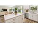 Open concept kitchen with quartz countertops, stainless appliances, and seamless access to the living area at 7201 S De Soto St, Tampa, FL 33616