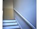 Close-up of the staircase and white banister at 7205 S De Soto St, Tampa, FL 33616