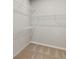 Walk-in closet with wire shelving at 837 Snail Kite Pl, Sun City Center, FL 33573