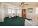 Living Room with light walls and wood cabinet at 116 W Saint Johns Way, Apollo Beach, FL 33572