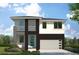 Modern two-story house with a dark-brown accent wall and light-grey siding at 7201 S De Soto St, Tampa, FL 33616