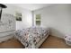 Bedroom with a queen bed and window at 17539 Balmaha Dr, Land O Lakes, FL 34638