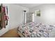Bedroom with a queen bed and armoire at 17539 Balmaha Dr, Land O Lakes, FL 34638