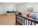 Spacious bedroom with two beds and ample floor space at 17539 Balmaha Dr, Land O Lakes, FL 34638