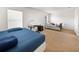 Bright bedroom with a large bed and window coverings at 17539 Balmaha Dr, Land O Lakes, FL 34638