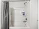 Clean shower/tub combo with gray curtain at 17539 Balmaha Dr, Land O Lakes, FL 34638