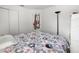 Bright bedroom with double bed, closet and a desk at 17539 Balmaha Dr, Land O Lakes, FL 34638