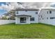 Newly built home with a spacious backyard and fenced area at 7203 S De Soto St, Tampa, FL 33616