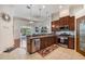 Bright kitchen with stainless steel appliances and breakfast bar at 19211 Pelican Ridge Ln, Tampa, FL 33647
