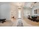 Bright and airy entryway with tile floors, high ceilings, and access to other rooms at 19211 Pelican Ridge Ln, Tampa, FL 33647