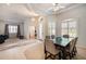 Casual dining area with a table for six and large windows at 19211 Pelican Ridge Ln, Tampa, FL 33647