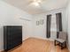 Spacious bedroom with wood floors, large closet, and dresser at 19211 Pelican Ridge Ln, Tampa, FL 33647