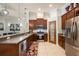 Modern kitchen with stainless steel appliances and an island at 19211 Pelican Ridge Ln, Tampa, FL 33647