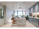 Modern kitchen with marble island and ocean views at 3015 S Ysabella Ave # 2703, Tampa, FL 33629