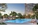 Resort-style pool with cabanas and plenty of lounge chairs at 3015 S Ysabella Ave # 2703, Tampa, FL 33629