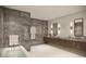 Spa-like bathroom with double vanity and soaking tub at 3015 S Ysabella Ave # 2703, Tampa, FL 33629