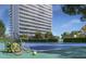 Tennis court with rackets and balls near building at 3015 S Ysabella Ave # 2703, Tampa, FL 33629