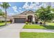 Image 1 of 77: 33199 Whisper Pointe Dr, Wesley Chapel