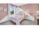 Charming bedroom with pink and white decor, and a window at 2831 Banks Pointe Dr, Bradenton, FL 34208