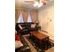 Comfortable living room featuring brown leather furniture at 4507 9Th W St # E8, Bradenton, FL 34207
