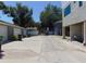 Residential alley with garages and new construction visible at 406 S Orleans Ave, Tampa, FL 33606
