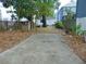 Large backyard with a shed and patio. Plenty of space for outdoor activities at 406 S Orleans Ave, Tampa, FL 33606