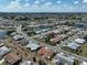 Aerial view showcasing home's location in a residential neighborhood at 1607 Cloister Dr, Sun City Center, FL 33573