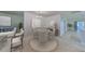 Elegant dining room featuring a round table with four chairs at 1607 Cloister Dr, Sun City Center, FL 33573