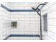 Stand up shower with subway tile and built in shelves at 7608 20Th Nw Ave, Bradenton, FL 34209