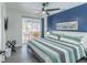 Bedroom with a king-size bed and access to the pool at 7608 20Th Nw Ave, Bradenton, FL 34209