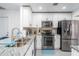 Modern kitchen with stainless steel appliances and granite countertops at 7608 20Th Nw Ave, Bradenton, FL 34209