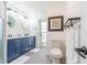 Bathroom with a double vanity and a walk-in shower at 7608 20Th Nw Ave, Bradenton, FL 34209