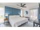 Spacious main bedroom with a king-size bed and access to a patio at 7608 20Th Nw Ave, Bradenton, FL 34209