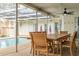 Relaxing poolside patio with table and chairs at 7608 20Th Nw Ave, Bradenton, FL 34209