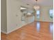 Inviting dining area featuring a stylish chandelier and an open view into the kitchen area at 2620 Locksley St # 261, Sun City Center, FL 33573