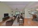 Inviting living room featuring modern furnishings and an open layout with hardwood floors and bright, airy feel at 2620 Locksley St # 261, Sun City Center, FL 33573