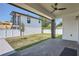 Private backyard with grassy area and covered patio at 325 33Rd N Ave, St Petersburg, FL 33704
