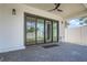 Covered patio with paver stones and sliding glass doors at 325 33Rd N Ave, St Petersburg, FL 33704