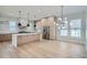 Modern kitchen with island, stainless steel appliances, and pendant lighting at 325 33Rd N Ave, St Petersburg, FL 33704