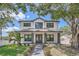 Modern farmhouse style home with dark gray metal roof at 325 33Rd N Ave, St Petersburg, FL 33704