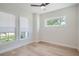 Bright bedroom with hardwood floors and ceiling fan at 325 33Rd N Ave, St Petersburg, FL 33704