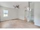 Bright bedroom with light hardwood floors and ceiling fan at 325 33Rd N Ave, St Petersburg, FL 33704