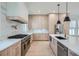 Modern kitchen with stainless steel appliances and marble countertops at 325 33Rd N Ave, St Petersburg, FL 33704
