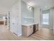 Modern wet bar with chevron tile backsplash and wine cooler at 325 33Rd N Ave, St Petersburg, FL 33704