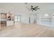 Open concept living room with hardwood floors and kitchen view at 325 33Rd N Ave, St Petersburg, FL 33704