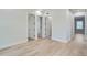 Bright hallway featuring hardwood floors and access to bedrooms at 325 33Rd N Ave, St Petersburg, FL 33704