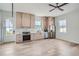 Modern kitchen with light wood cabinets, stainless steel appliances, and breakfast bar at 325 33Rd N Ave, St Petersburg, FL 33704
