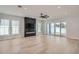 Spacious living room with fireplace and sliding glass doors at 325 33Rd N Ave, St Petersburg, FL 33704