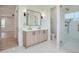Elegant bathroom with double vanity, quartz countertop and a walk-in shower at 325 33Rd N Ave, St Petersburg, FL 33704